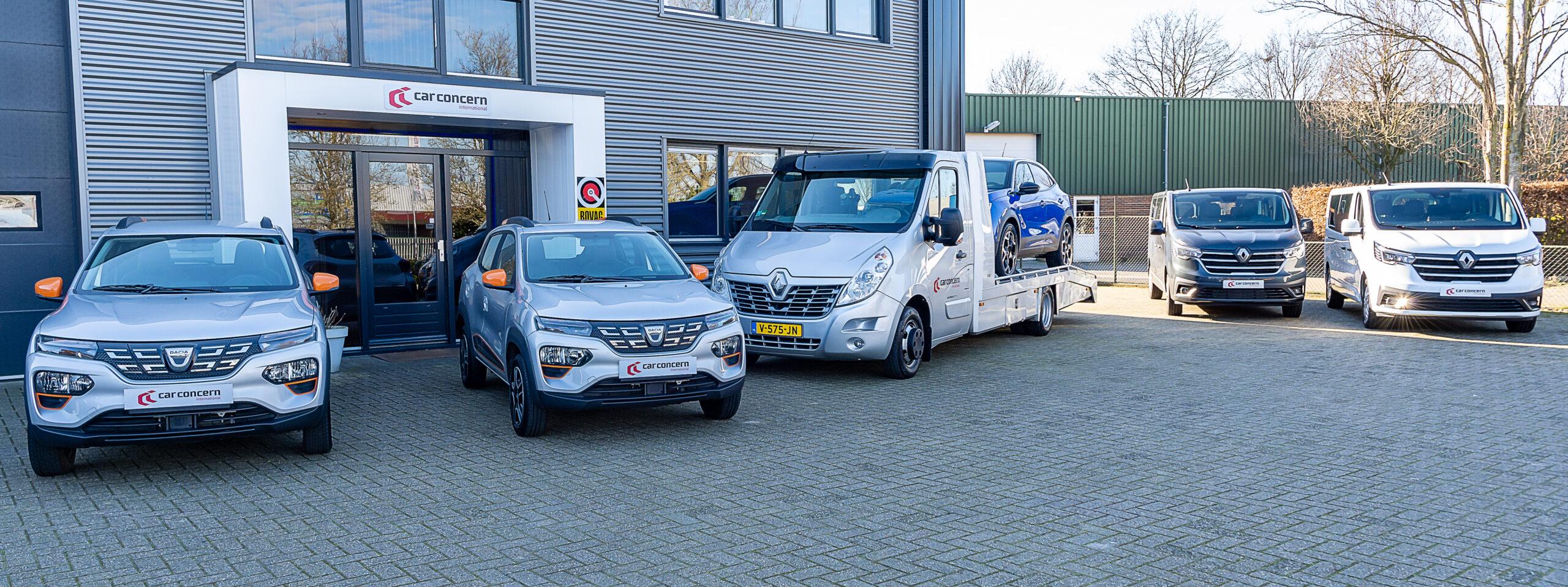 De entree van Car Concern International met twee Dacia Spring, de oprijwagen en twee Renault Trafics